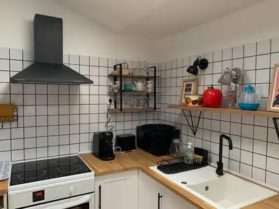 Cuisine ou kitchenette dans l'établissement Charmant T2 très cosy au calme en hyper centre.