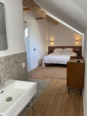 Un ou plusieurs lits dans un hébergement de l'établissement Villa Paignon