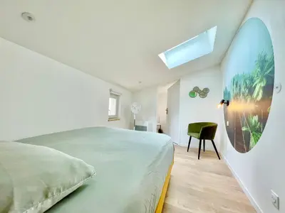 Un ou plusieurs lits dans un hébergement de l'établissement Niort - Hyper-Centre - Appartements en Duplex ou Triplex - Wifi Fibre - NOUVEAU