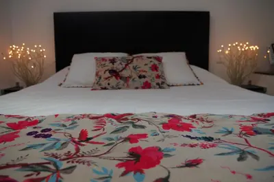 Un ou plusieurs lits dans un hébergement de l'établissement Chambres d'hôtes Home Sweet Home