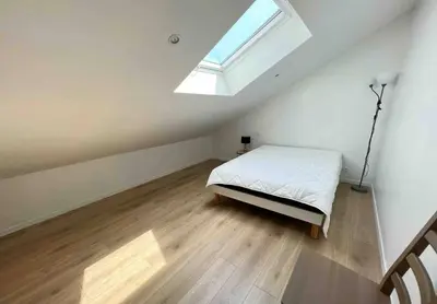 Un ou plusieurs lits dans un hébergement de l'établissement Maison hyper centre 3 chambres