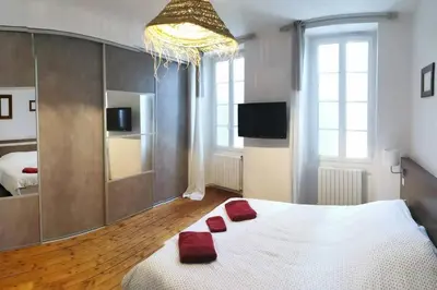 Un ou plusieurs lits dans un hébergement de l'établissement Agréable maison de ville, de 1 à 6 personnes, à 5 min à pied du centre ville de Cognac
