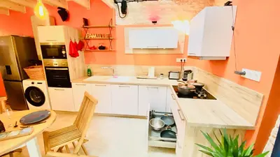 Cuisine ou kitchenette dans l'établissement L'atelier - Duplex Gîte de charme avec Spa La Rochelle