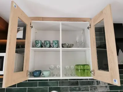 Cuisine ou kitchenette dans l'établissement Jolie Maison au 34 centre-ville