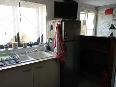 Cuisine ou kitchenette dans l'établissement Gîte Zoé
