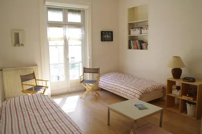 Un ou plusieurs lits dans un hébergement de l'établissement Très lumineux, au coeur de la vieille ville, 86 m²