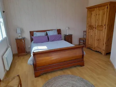 Un ou plusieurs lits dans un hébergement de l'établissement Chambre d'hôtes de l'Ancienne école
