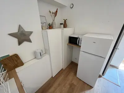 Cuisine ou kitchenette dans l'établissement Le coin Cosy de l'Yser