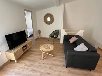 Télévision ou salle de divertissement dans l'établissement Le coin Cosy de l'Yser