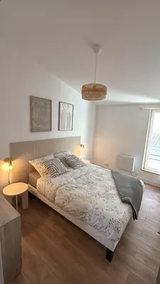 Un ou plusieurs lits dans un hébergement de l'établissement Le coin Cosy de l'Yser