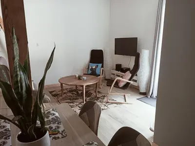 Télévision ou salle de divertissement dans l'établissement Le hangar de mamie