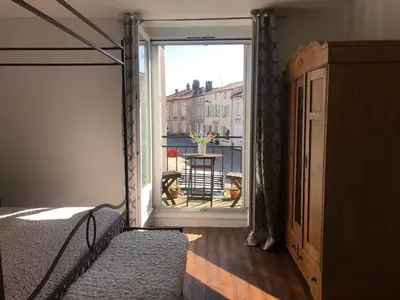 Un ou plusieurs lits dans un hébergement de l'établissement Le Petit Maison