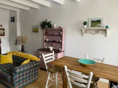 Coin salon dans l'établissement Le Petit Maison