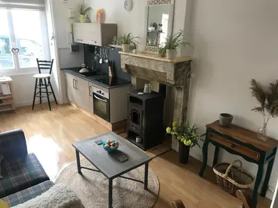 Cuisine ou kitchenette dans l'établissement Le Petit Maison