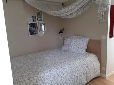 Un ou plusieurs lits dans un hébergement de l'établissement Mini Loft