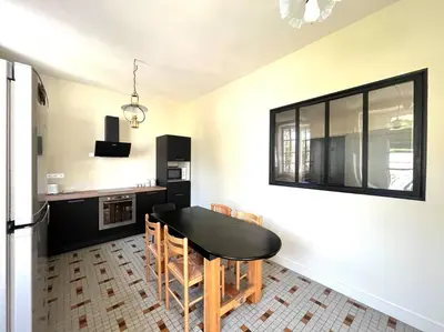 Cuisine ou kitchenette dans l'établissement Charmante charentaise