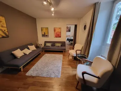 Coin salon dans l'établissement Le P’tit Nid