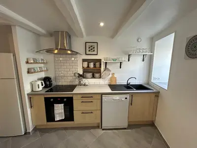 Cuisine ou kitchenette dans l'établissement Gîte des Hirondelles