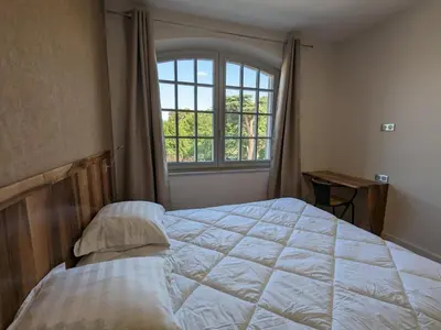 Un ou plusieurs lits dans un hébergement de l'établissement Séjour de luxe au cœur de Mainxe, avec truffe et cours de cuisine, idéal pour 4 couples - FR-1-653-235