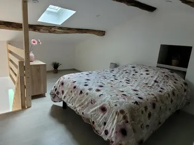 Un ou plusieurs lits dans un hébergement de l'établissement Appartement récemment rénové