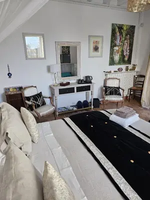 Coin salon dans l'établissement Chambre d'Hôtes LES ROCHES
