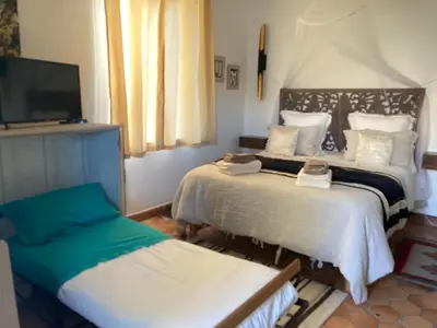 Un ou plusieurs lits dans un hébergement de l'établissement Chambre d'Hôtes LES ROCHES
