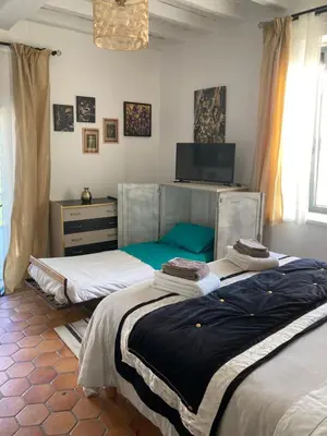 Un ou plusieurs lits dans un hébergement de l'établissement Chambre d'Hôtes LES ROCHES