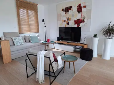 Télévision ou salle de divertissement dans l'établissement Havre de Thairé