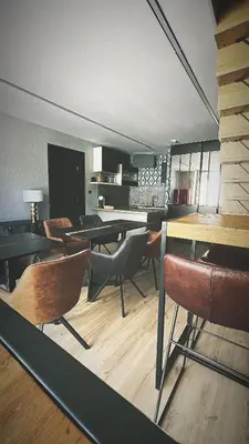 Coin salon dans l'établissement Le240b #3