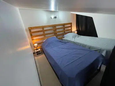 Un ou plusieurs lits dans un hébergement de l'établissement Appartement vue sur la Charente