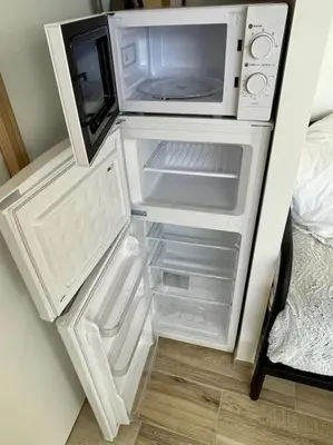 Cuisine ou kitchenette dans l'établissement Studio indépendant 4 personnes