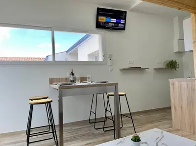 Télévision ou salle de divertissement dans l'établissement Studio indépendant 4 personnes