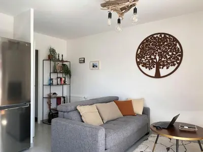 Coin salon dans l'établissement Appt confort avec terrasse au calme à Fouras!
