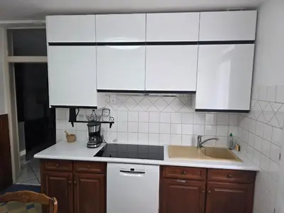 Cuisine ou kitchenette dans l'établissement Les Mouflets