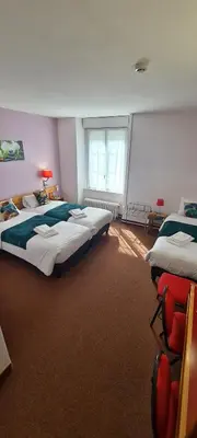 Un ou plusieurs lits dans un hébergement de l'établissement Le 120 - Groupe Logis Hotels - Ex Auberge la Terrasse