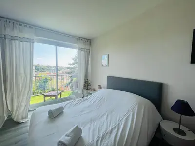 Un ou plusieurs lits dans un hébergement de l'établissement Le Rétro - Splendide appartement