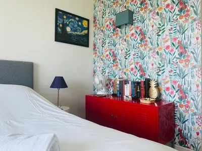 Un ou plusieurs lits dans un hébergement de l'établissement Le Rétro - Splendide appartement