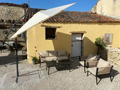 Terrasse ou espace extérieur de l'établissement L'ancien Cafe - Suites and Gites