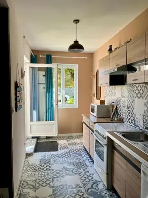 Cuisine ou kitchenette dans l'établissement L'écolier futuroscope 4 personnes
