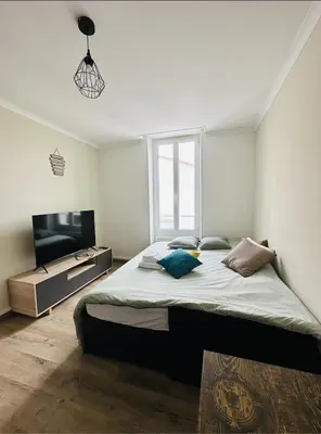 Un ou plusieurs lits dans un hébergement de l'établissement Le Cocooning, Cœur Cognac, WiFi Fibre et Parking