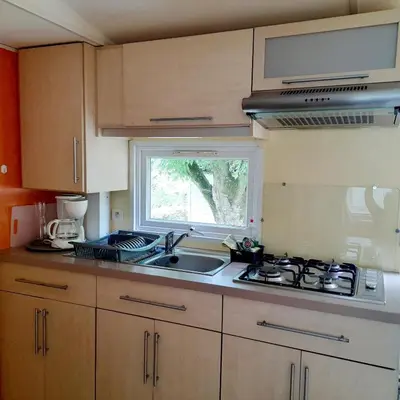 Cuisine ou kitchenette dans l'établissement Camping Margot