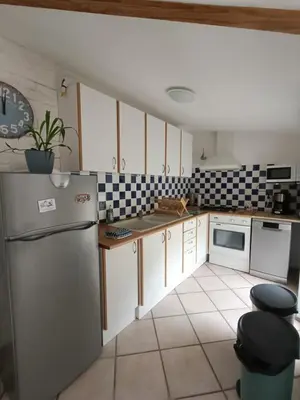 Cuisine ou kitchenette dans l'établissement Maison de vacances en plein cœur de Châtelaillon-Plage