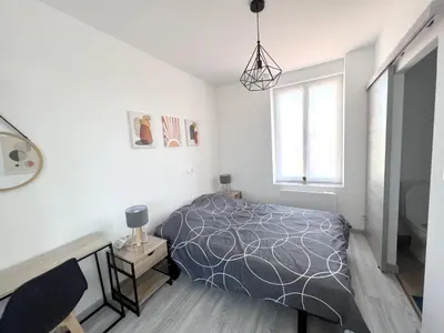 Un ou plusieurs lits dans un hébergement de l'établissement 180B - Duplex T2 Tout Confort - Wifi Netflix