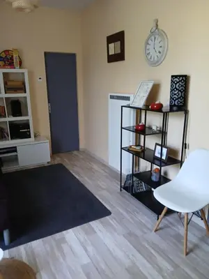 Coin salon dans l'établissement Gite les genêts