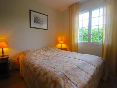 Un ou plusieurs lits dans un hébergement de l'établissement Villa with garden near beautiful golf course