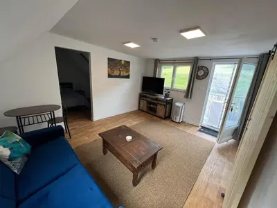 Télévision ou salle de divertissement dans l'établissement Maple Tree Chambre d'hôtes