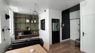 Cuisine ou kitchenette dans l'établissement Le Tréville Grand Studio Cosy 32M2