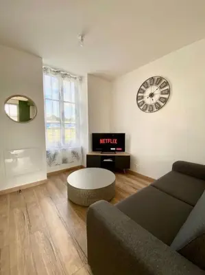 Coin salon dans l'établissement LOFT Jardin et Spa