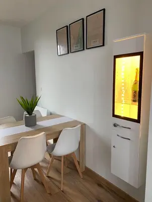 Cuisine ou kitchenette dans l'établissement LOFT Jardin et Spa