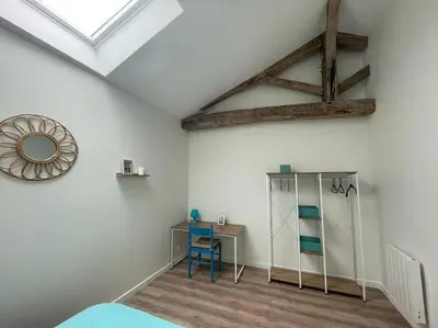 Un ou plusieurs lits dans un hébergement de l'établissement Gîte de charme - 3 chambres, 5 lits - de 4 à 7 personnes